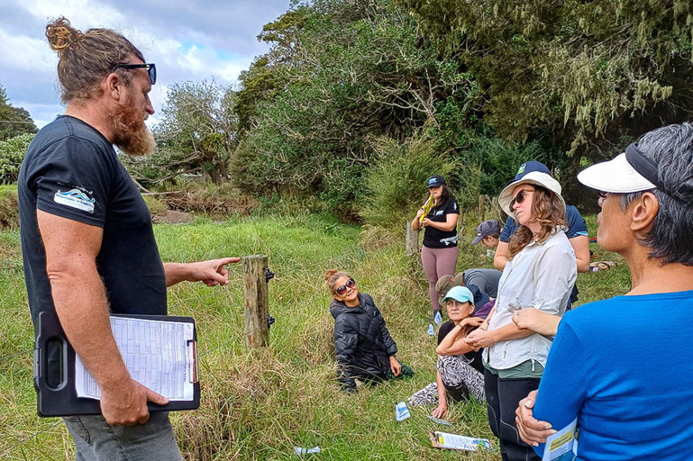 Lesson near stream at Whananaki Training Wananga